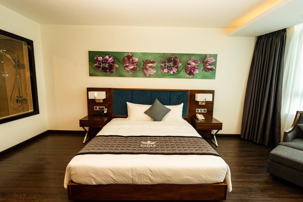 Eagle Hotel Dai Tiet Exterior foto
