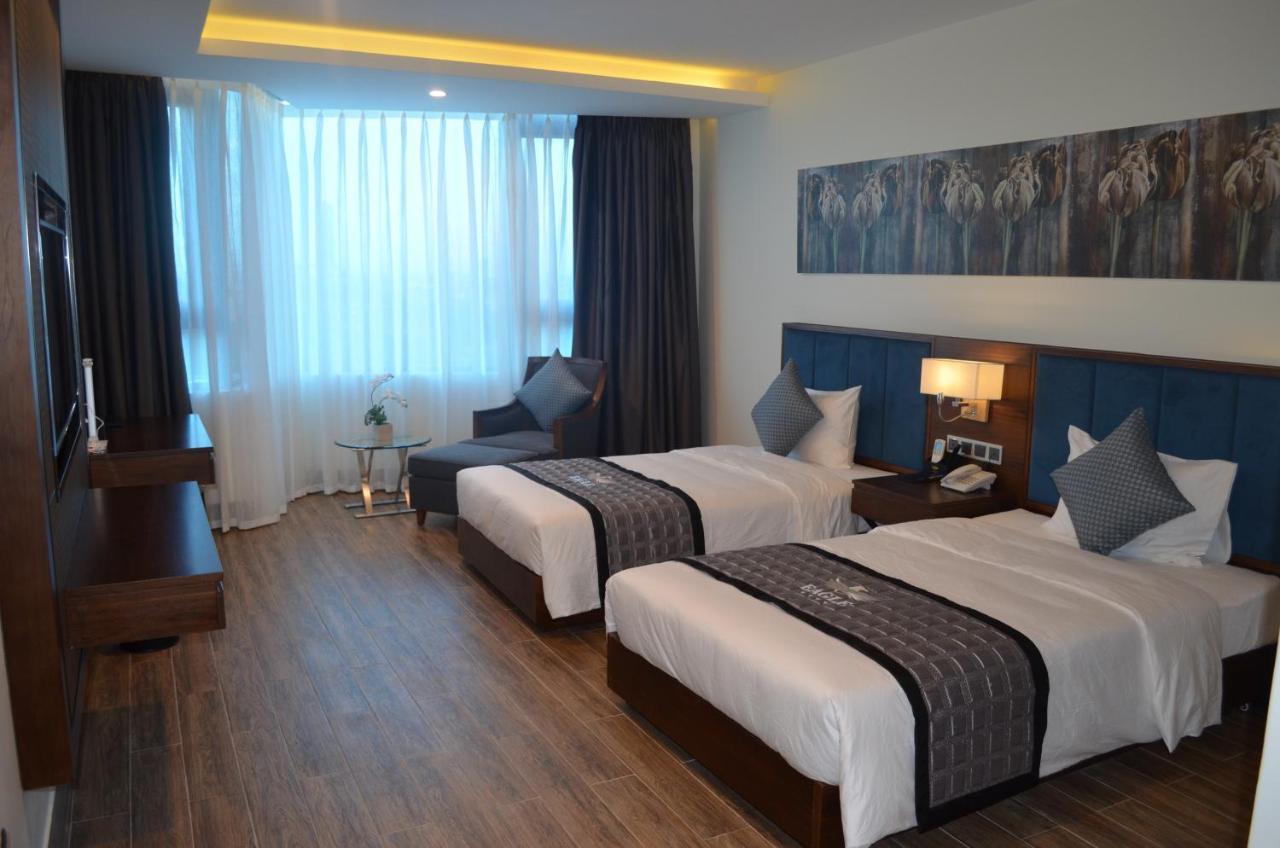 Eagle Hotel Dai Tiet Exterior foto